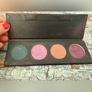 Younique Eyeshadow Palette with Dark Teal, light Purple , Tan, and Plum